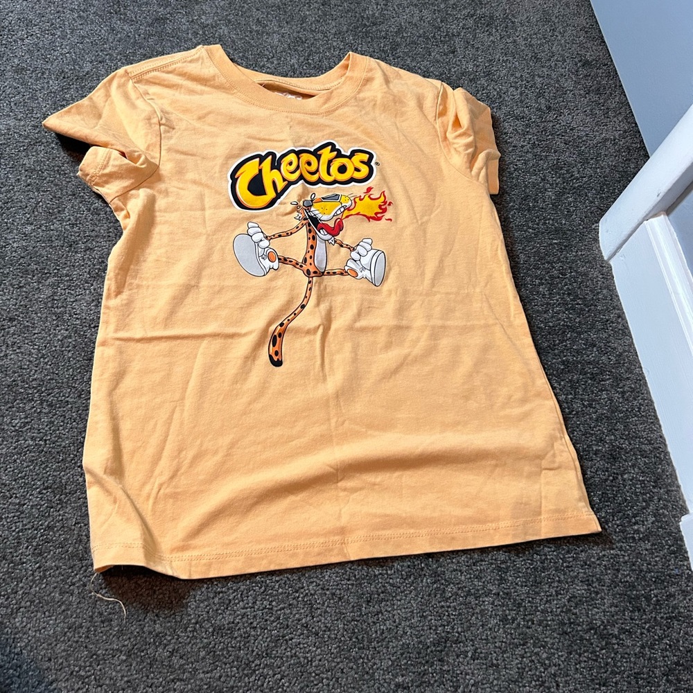 Hot Cheetos shirt 👀.